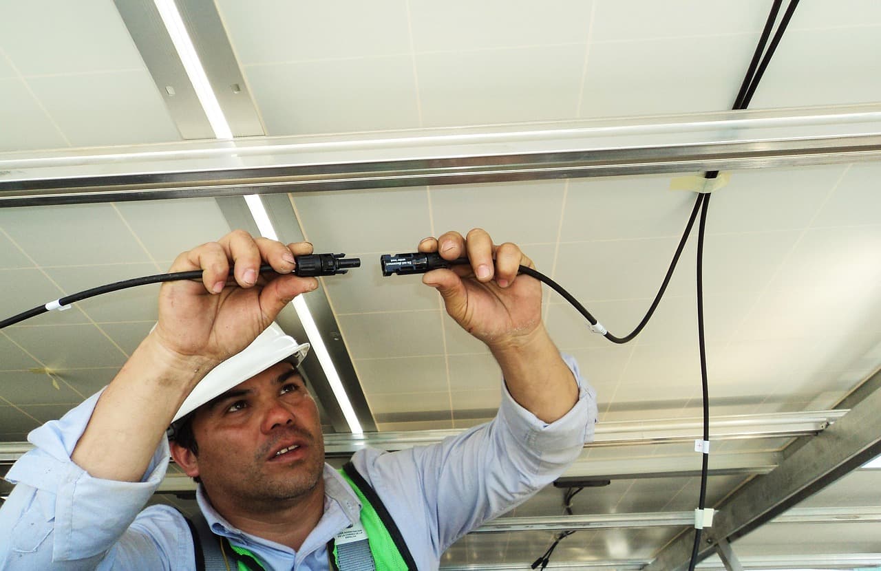 Suryam Tech installers at work on a rooftop